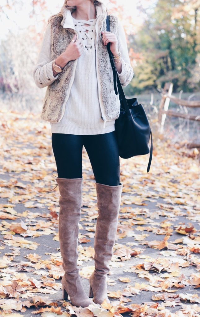 Connecticut life and style blogger, Pinteresting Plans shares a holiday out complete with lace-up sweater, fur vest, and over the knee boots.