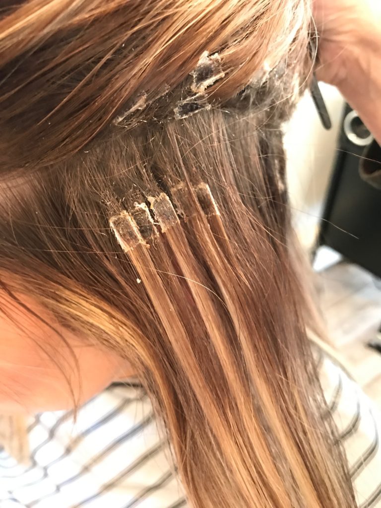 bonded hair extensions aftercare - photo of bonds before touch up at salon